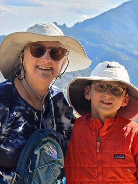 My son and I hiking mountain in Boulder