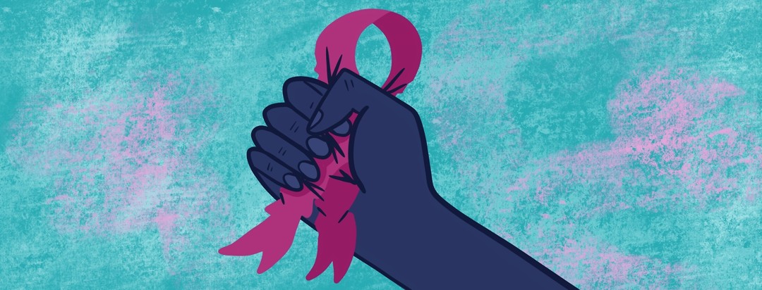 A hand crushes the pink awareness month ribbon