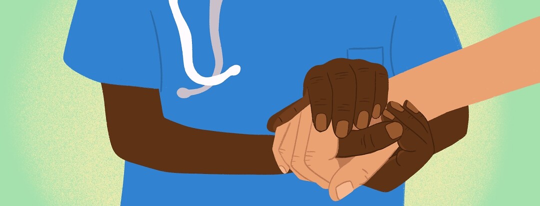 A nurse or doctor holds the hand of a patient