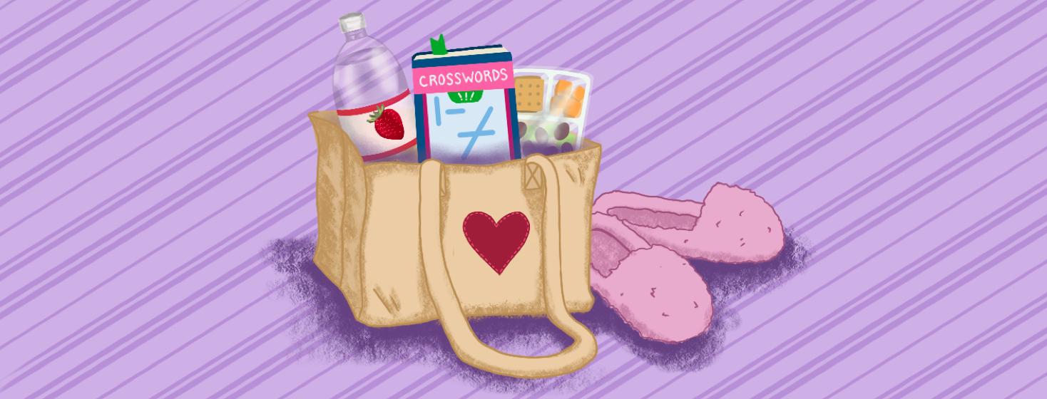 A pair of pink fuzzy slippers and a canvas bag filled with strawberry flavored water, a crossword puzzle book, and a package of snacks, cheese, crackers, grapes.
