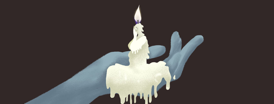 Hand-extended holding candle that is melting.